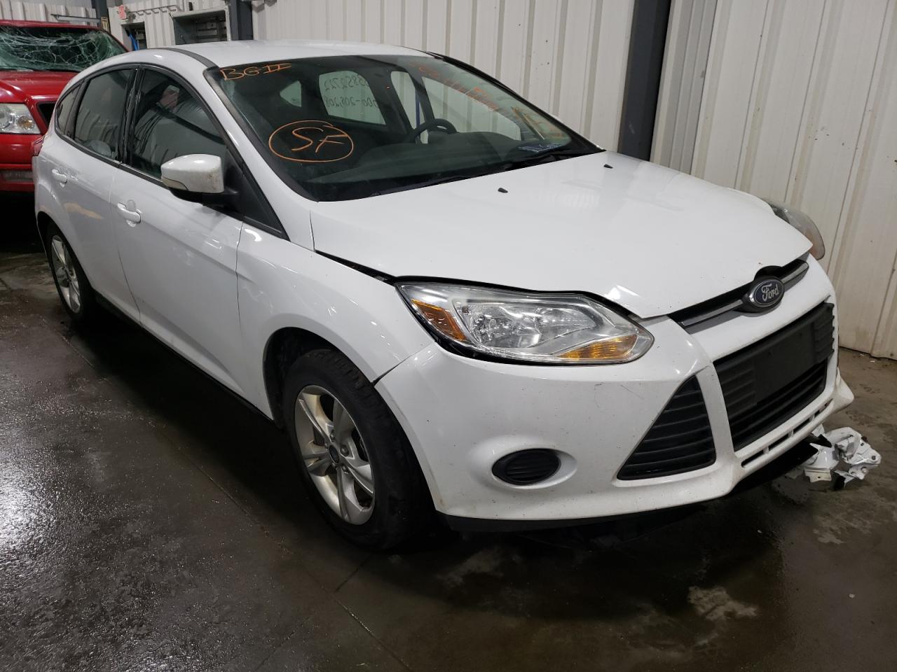 FORD FOCUS SE 2014 with VIN 1FADP3K24EL305798 - Photo from auction