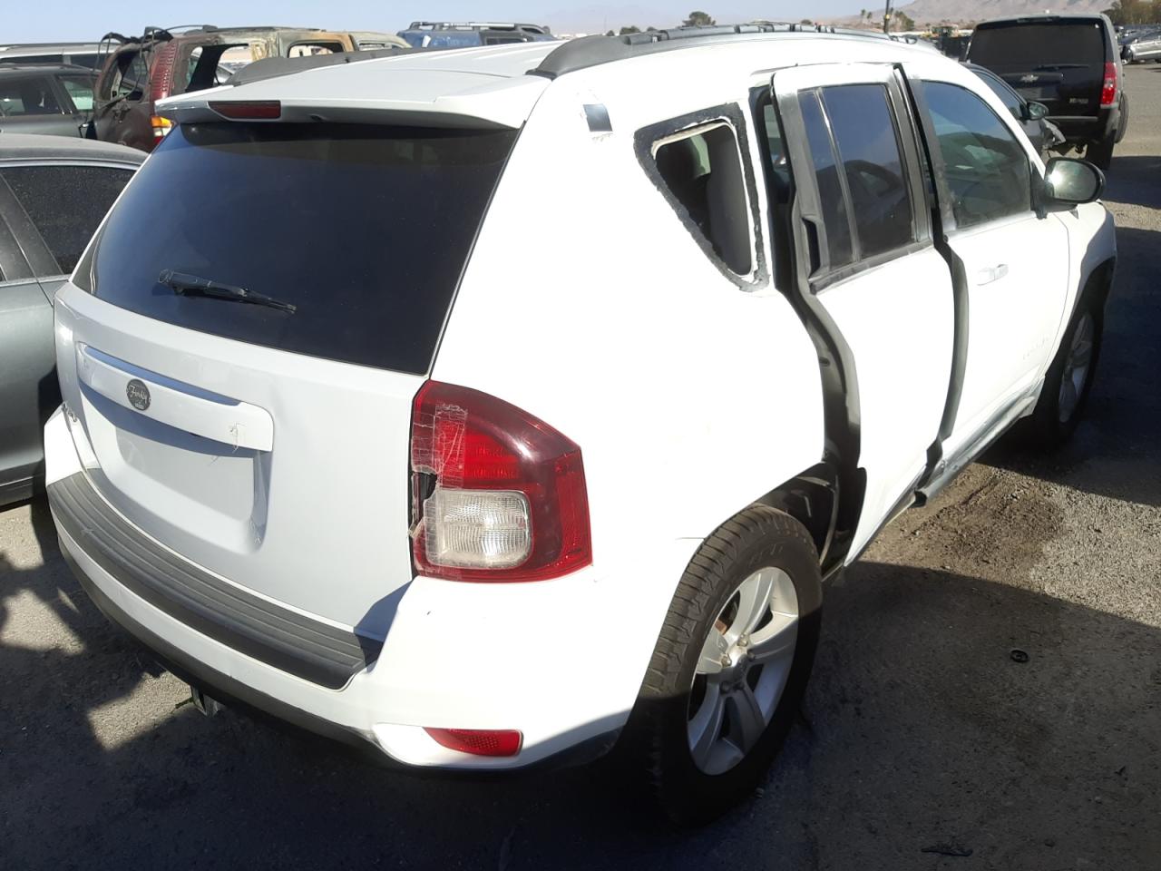 Photo 4 from auction – 2014 JEEP COMPASS SP with VIN 1C4NJDBB6ED815831
