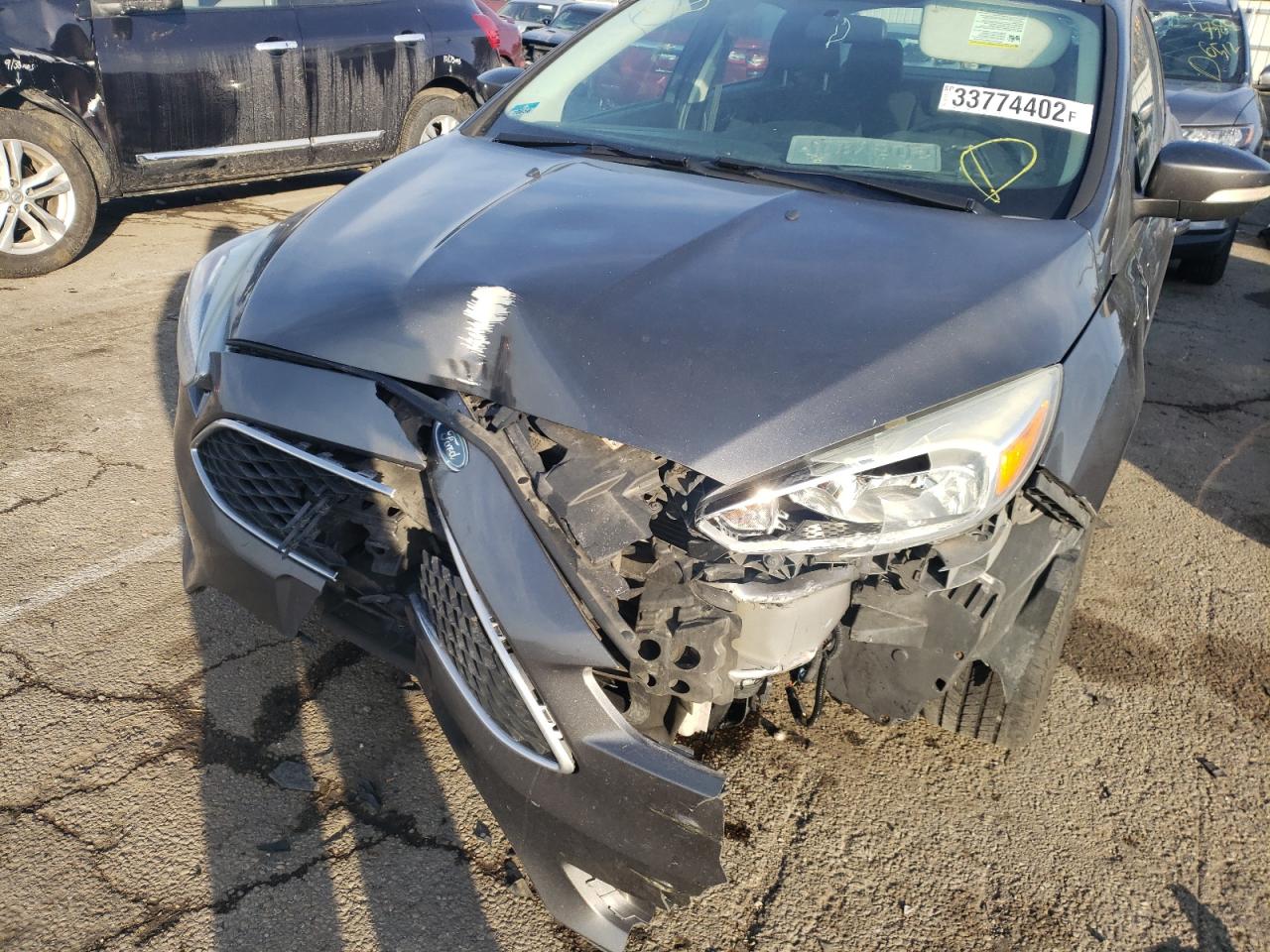 Photo 9 from auction – 2015 FORD FOCUS SE with VIN 1FADP3F23FL288276