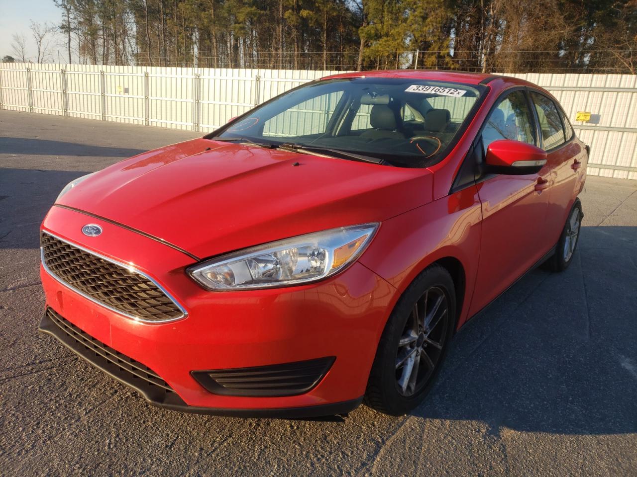 Photo 2 from auction – 2016 FORD FOCUS SE with VIN 1FADP3F24GL276977
