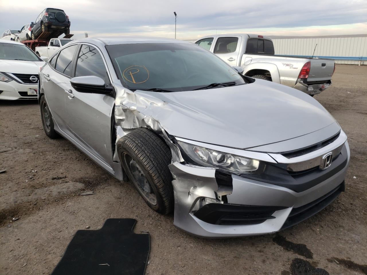 Photo 9 from auction – 2017 HONDA CIVIC LX with VIN 19XFC2E57HE082068