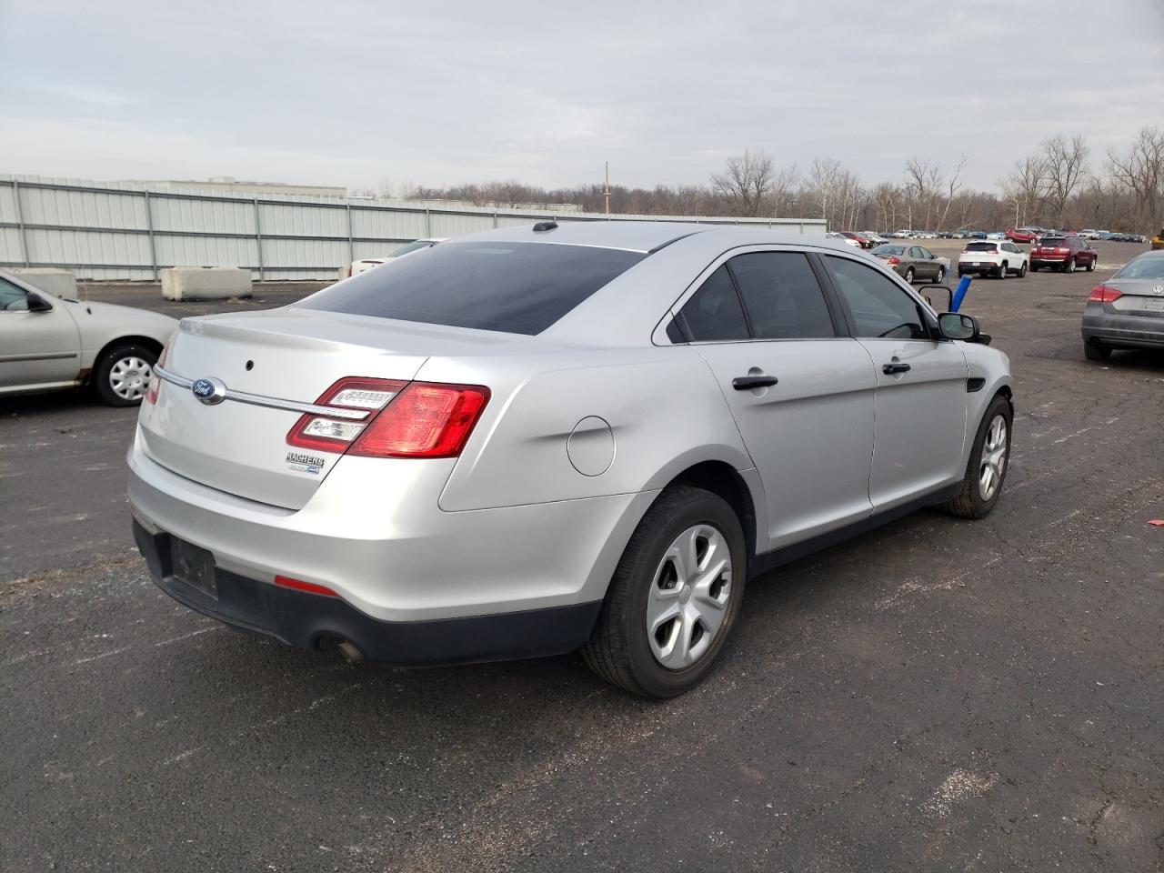 Photo 4 from auction – 2015 FORD TAURUS POL with VIN 1FAHP2MK2FG149053