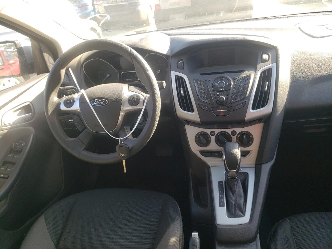 Photo 9 from auction – 2014 FORD FOCUS SE with VIN 1FADP3F23EL285344