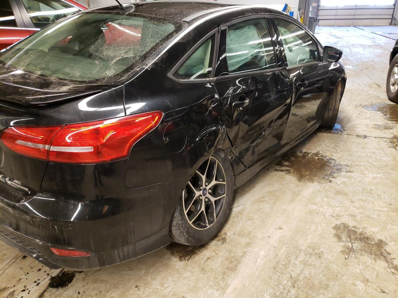 Photo 9 from auction – 2015 FORD FOCUS SE with VIN 1FADP3F26FL239234