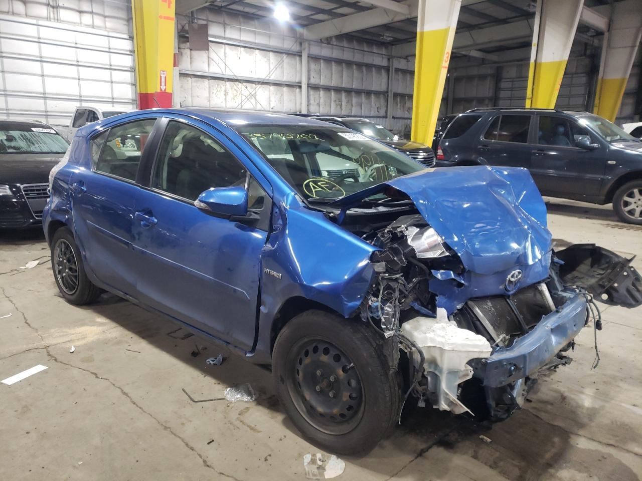 TOYOTA PRIUS C 2013 with VIN JTDKDTB32D1051165 - Photo from auction