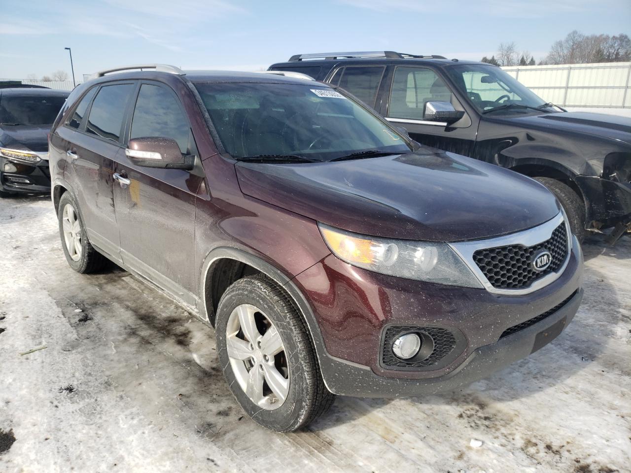 KIA SORENTO EX 2012 with VIN 5XYKU4A64CG284741 - Photo from auction