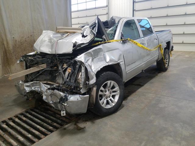 Photo 2 from auction – 2018 CHEVROLET SILVERADO with VIN 3GCUKREC1JG602020