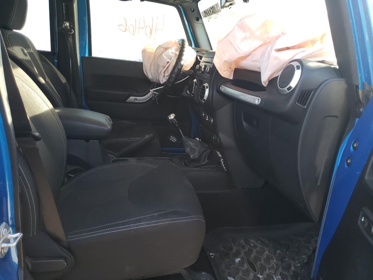 Photo 5 from auction – 2016 JEEP WRANGLER U with VIN 1C4BJWEG7GL210781