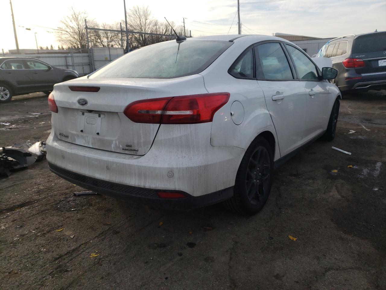 Photo 4 from auction – 2016 FORD FOCUS SE with VIN 1FADP3F24GL359177