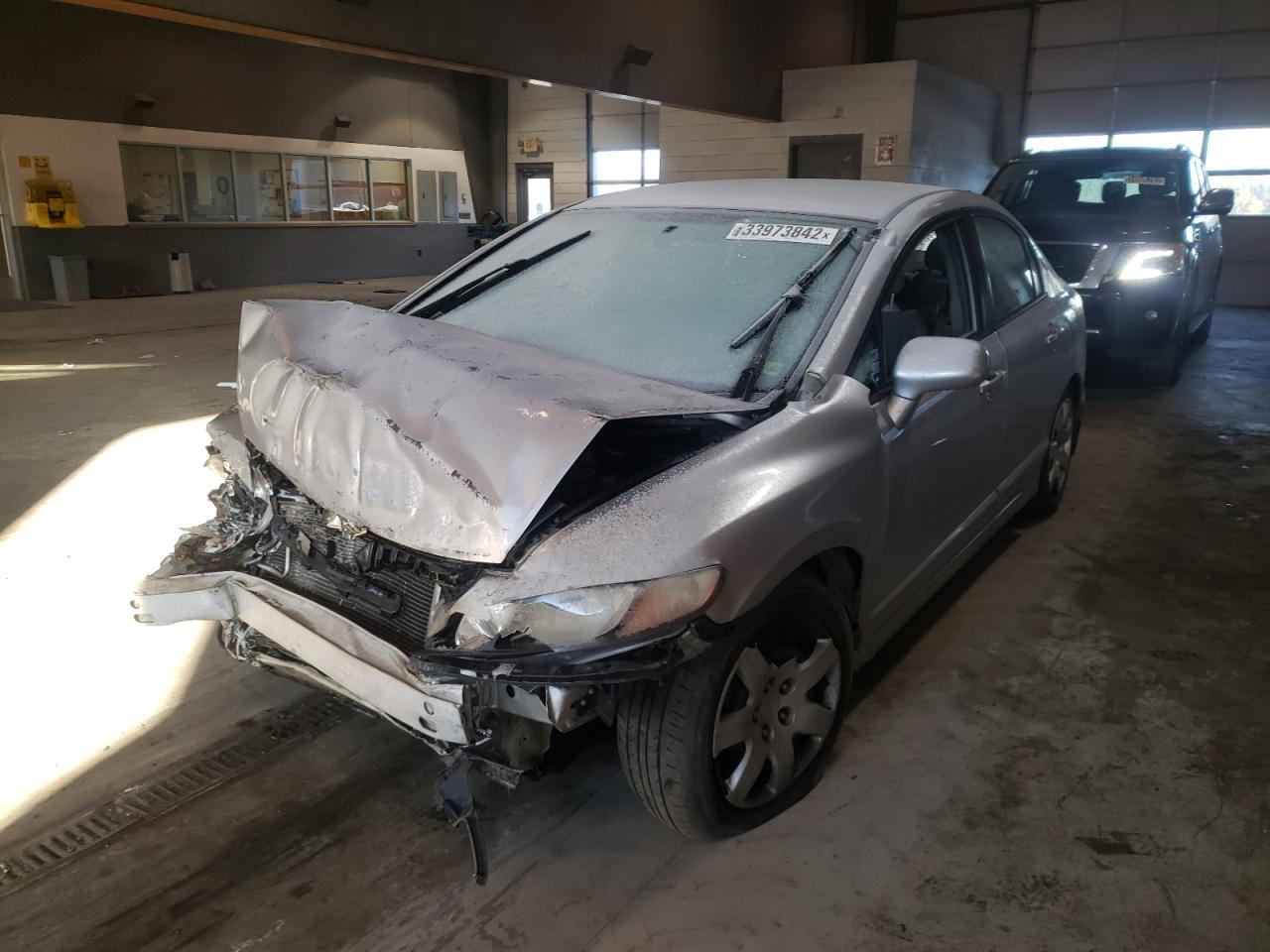 Photo 2 from auction – 2010 HONDA CIVIC LX with VIN 2HGFA1F59AH316835