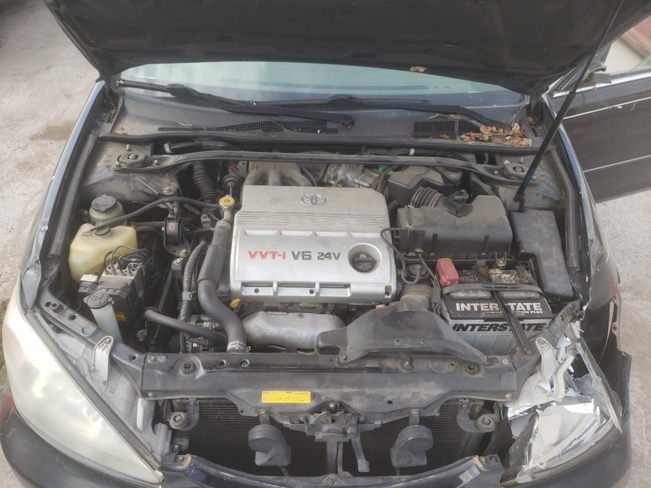 Photo 7 from auction – 2004 TOYOTA CAMRY LE with VIN JTDBF30K540152596