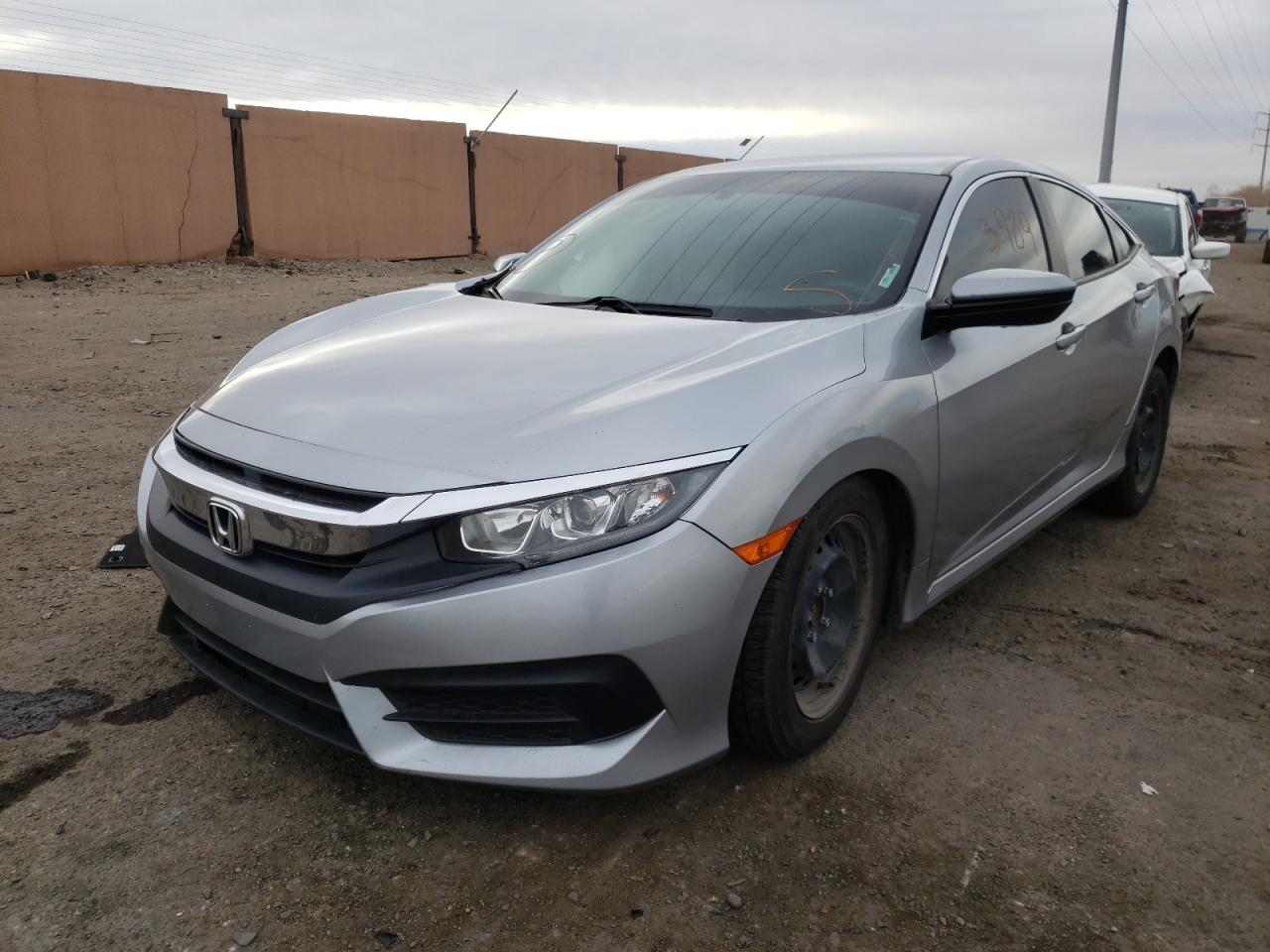Photo 2 from auction – 2017 HONDA CIVIC LX with VIN 19XFC2E57HE082068