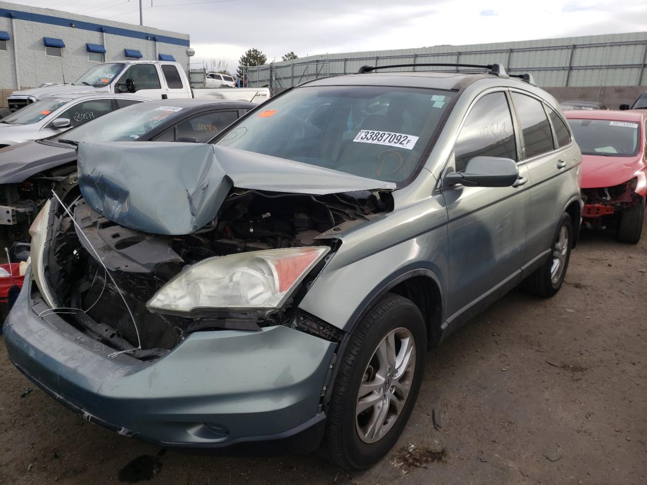 Photo 2 from auction – 2011 HONDA CR-V EXL with VIN 5J6RE3H77BL006823
