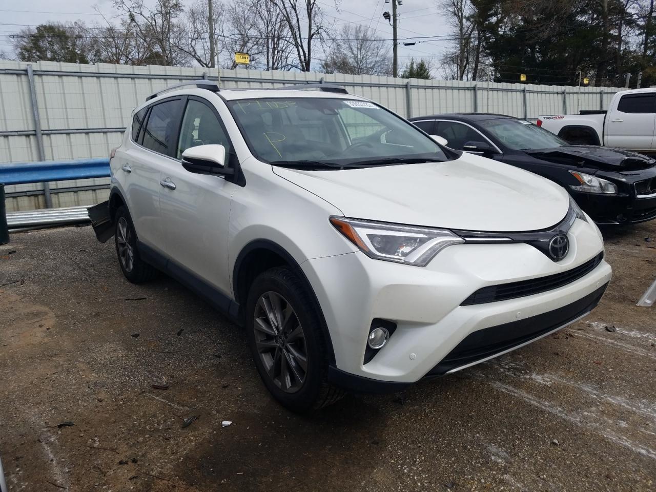 TOYOTA RAV4 LIMIT 2017 with VIN JTMYFREV6HD102093 - Photo from auction
