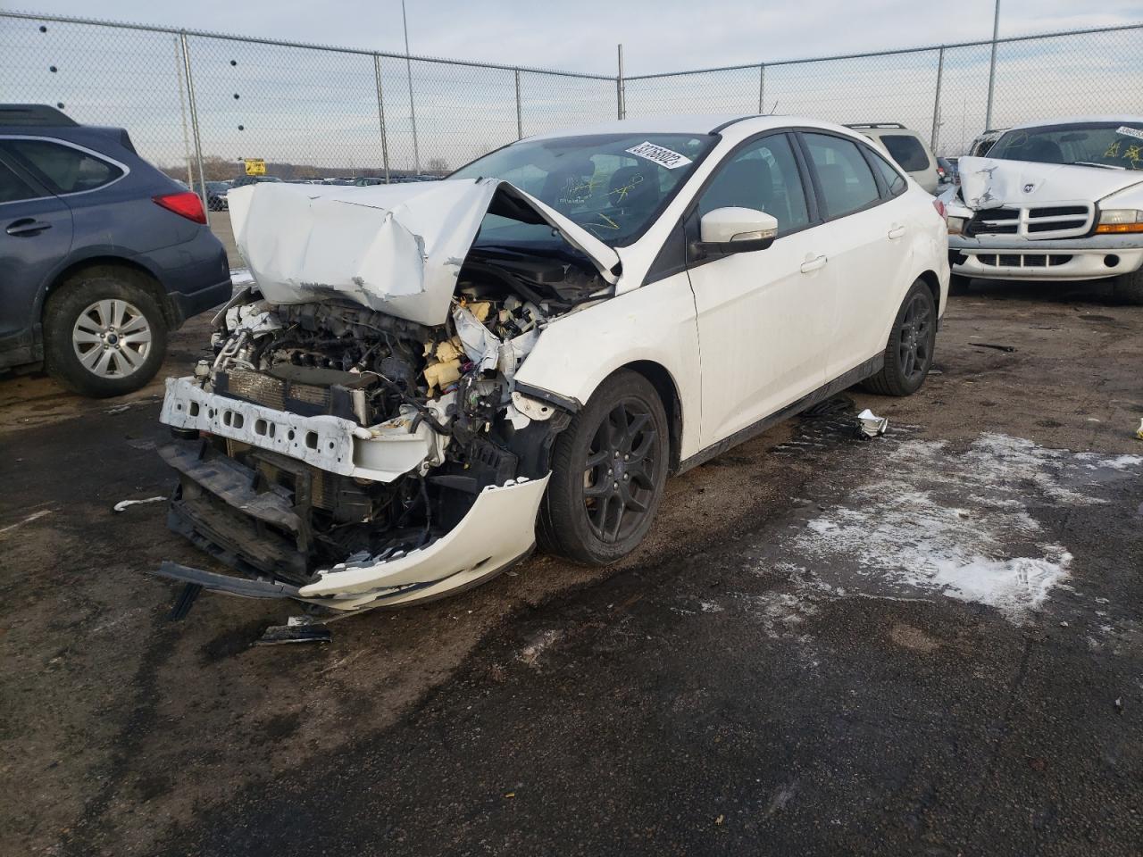 Photo 2 from auction – 2016 FORD FOCUS SE with VIN 1FADP3F24GL359177