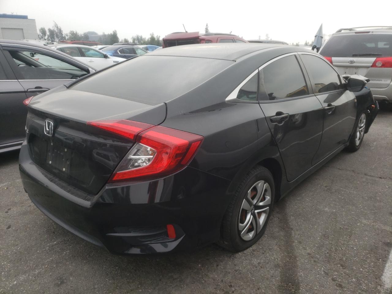 Photo 4 from auction – 2017 HONDA CIVIC LX with VIN 2HGFC2F56HH514279
