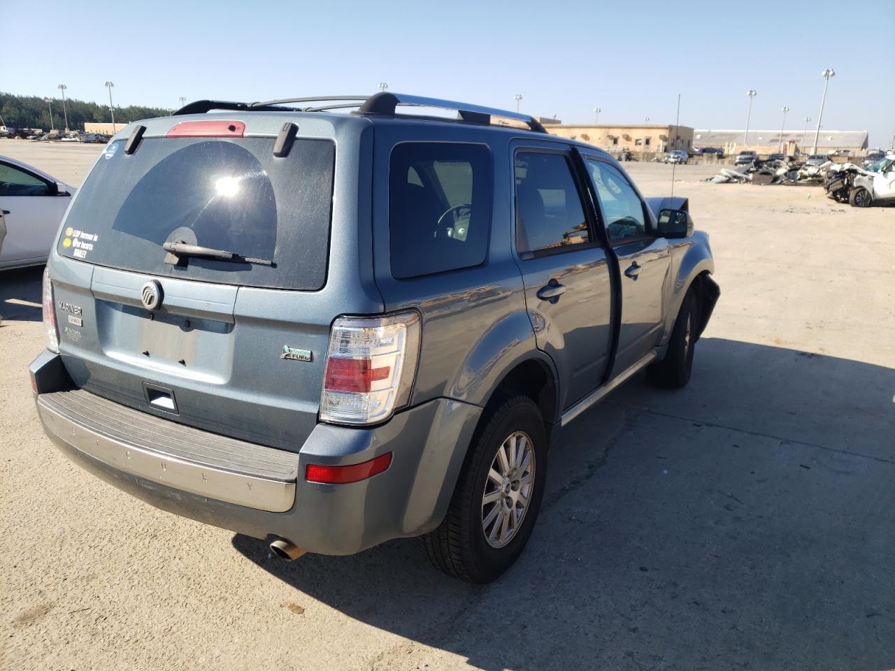 Photo 4 from auction – 2011 MERCURY MARINER PR with VIN 4M2CN8HG7BKJ07112