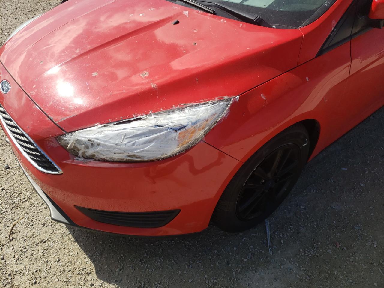 Photo 9 from auction – 2016 FORD FOCUS SE with VIN 1FADP3F21GL277827