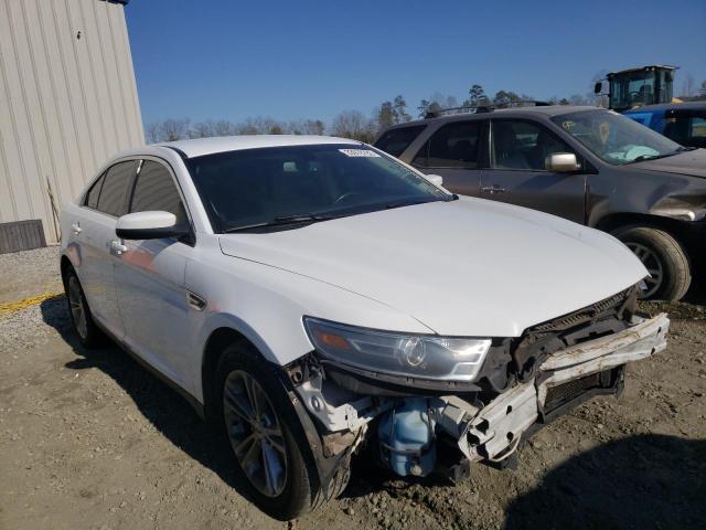 FORD TAURUS SEL 2014 with VIN 1FAHP2E82EG168574 - Photo from auction