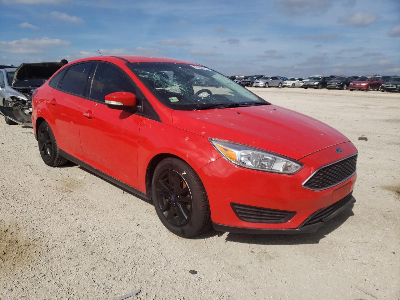 FORD FOCUS SE 2016 with VIN 1FADP3F21GL277827 - Photo from auction