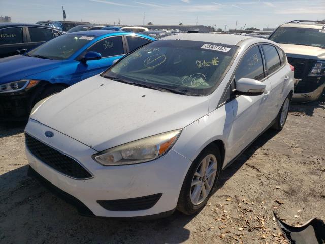 Photo 2 from auction – 2015 FORD FOCUS SE with VIN 1FADP3K22FL215325