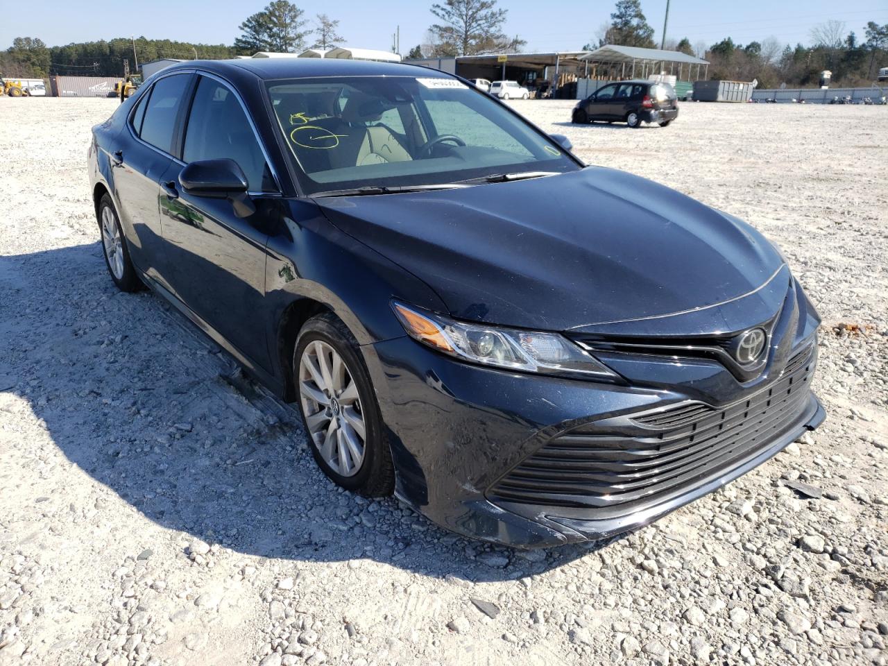 TOYOTA CAMRY LE 2020 with VIN 4T1C11AK2LU340825 - Photo from auction