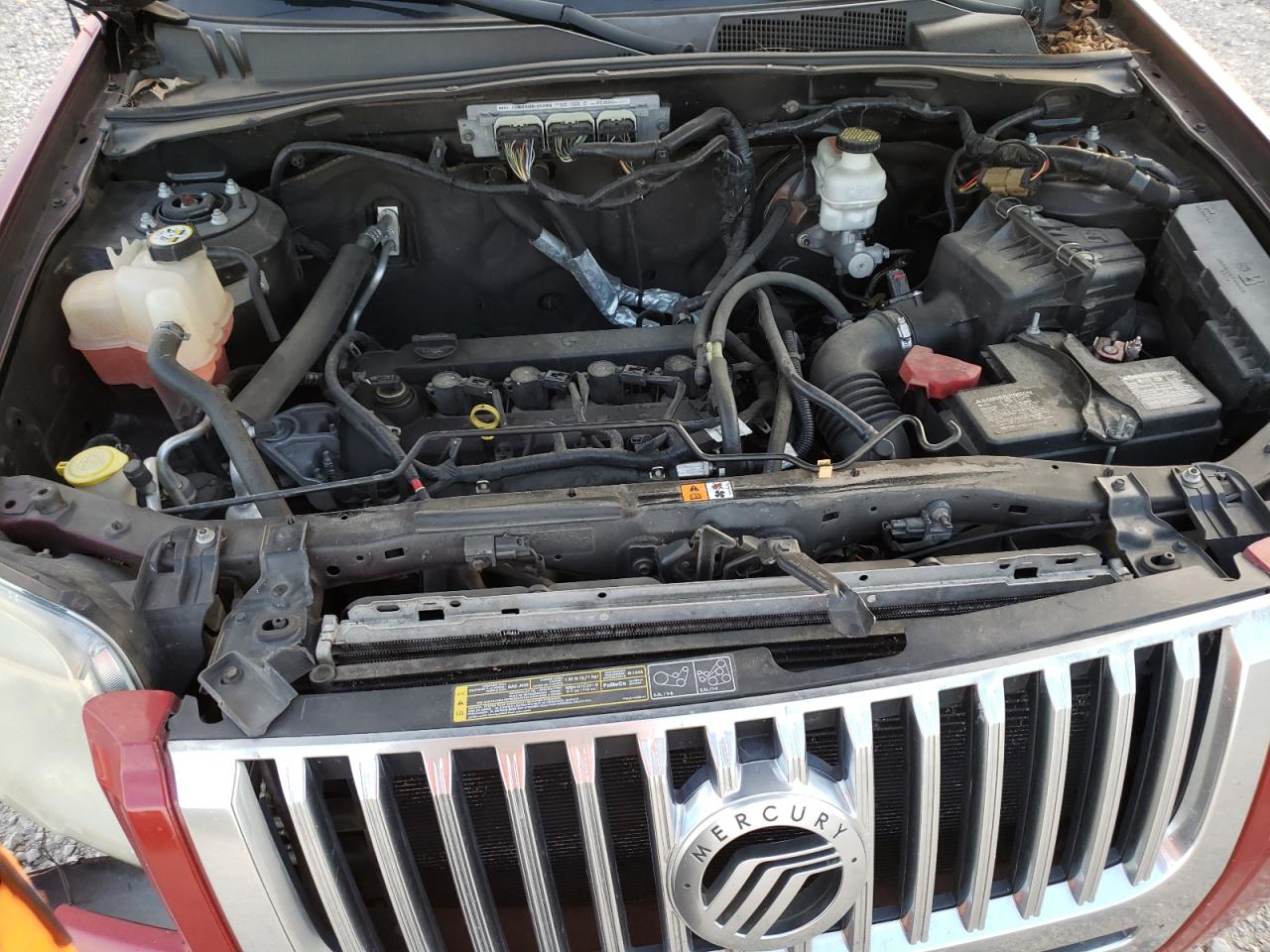 Photo 7 from auction – 2010 MERCURY MARINER with VIN 4M2CN8B79AKJ07359
