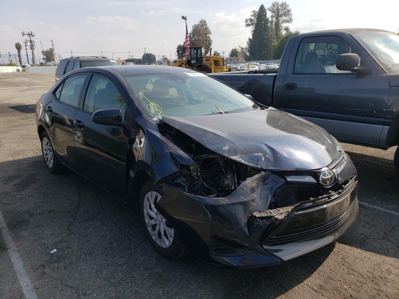 TOYOTA COROLLA L 2019 with VIN 5YFBURHE8KP895067 - Photo from auction