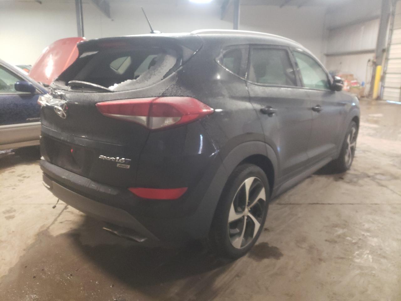 Photo 4 from auction – 2016 HYUNDAI TUCSON LIM with VIN KM8J3CA25GU237627
