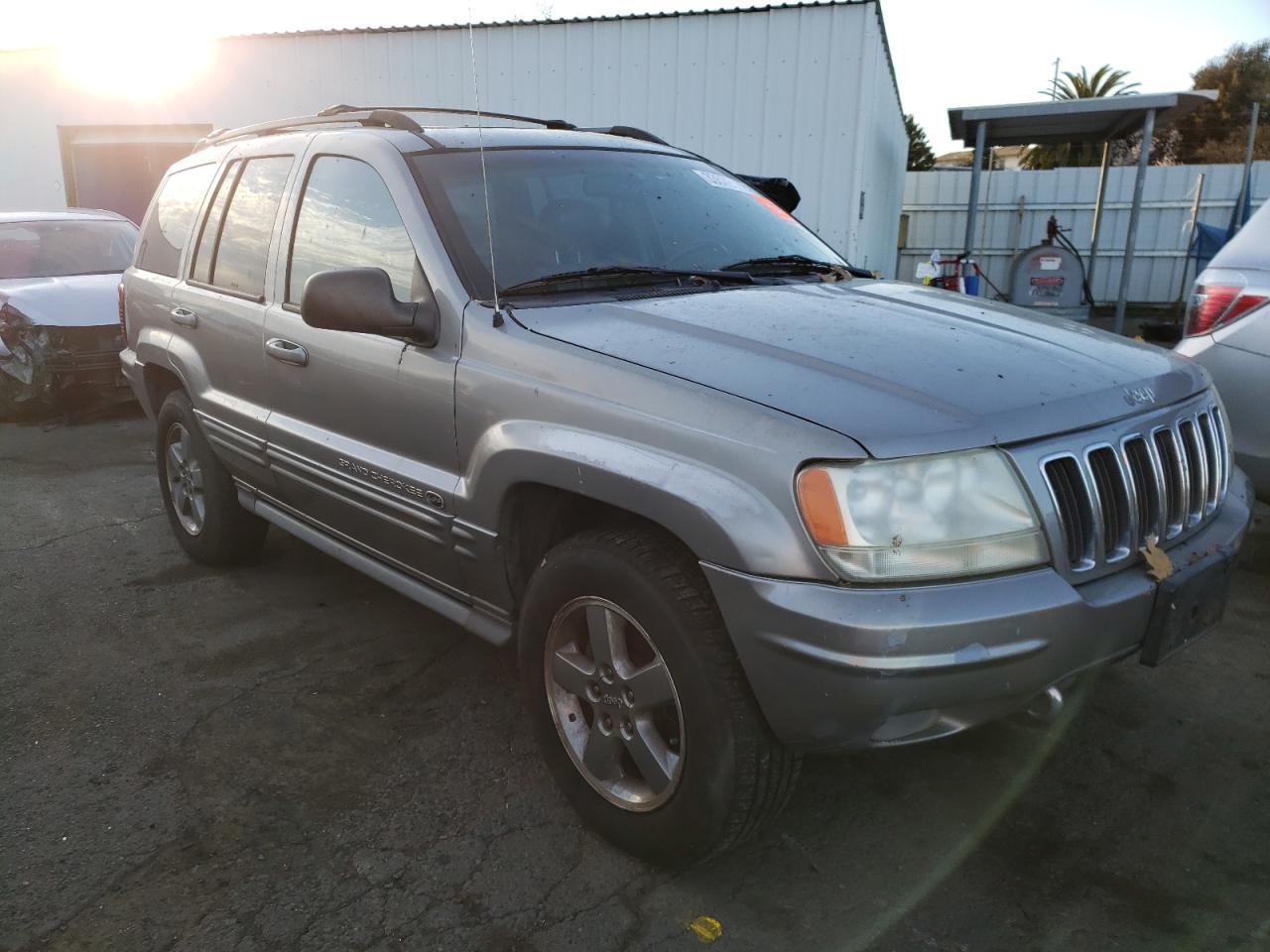 JEEP GRAND CHER 2002 with VIN 1J8GW68J12C155938 - Photo from auction