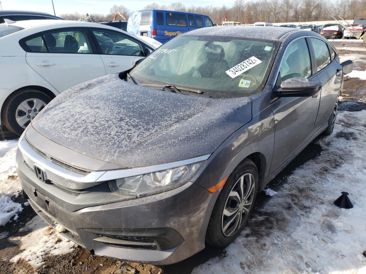 Photo 2 from auction – 2018 HONDA CIVIC LX with VIN 2HGFC2F58JH588339