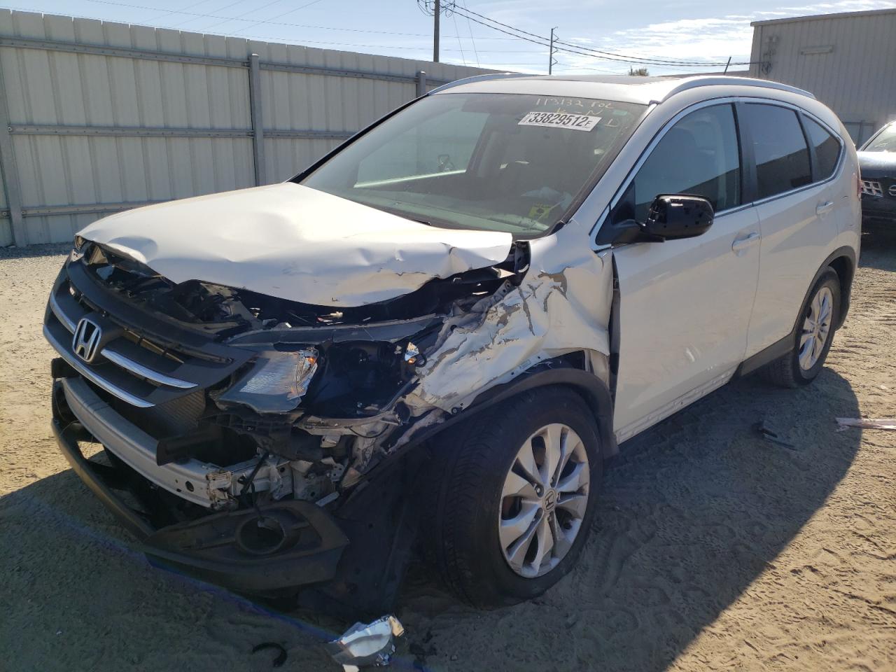 Photo 2 from auction – 2014 HONDA CR-V EXL with VIN 5J6RM3H71EL016240