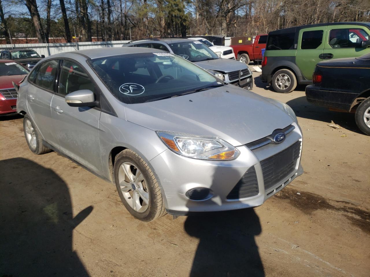 FORD FOCUS SE 2014 with VIN 1FADP3F23EL285344 - Photo from auction
