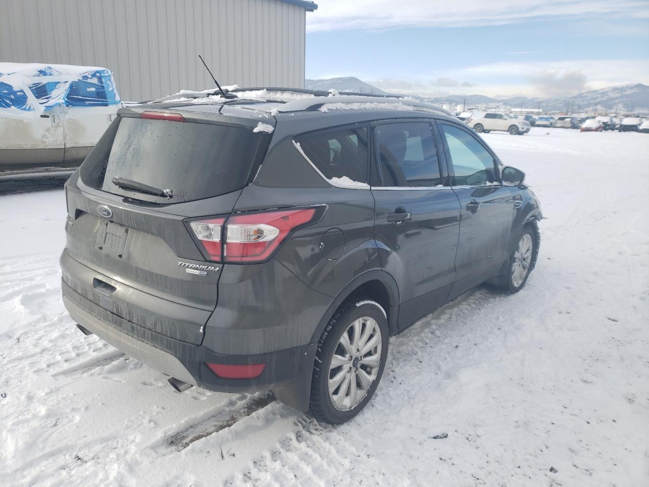 Photo 4 from auction – 2017 FORD ESCAPE TIT with VIN 1FMCU9J98HUC96288
