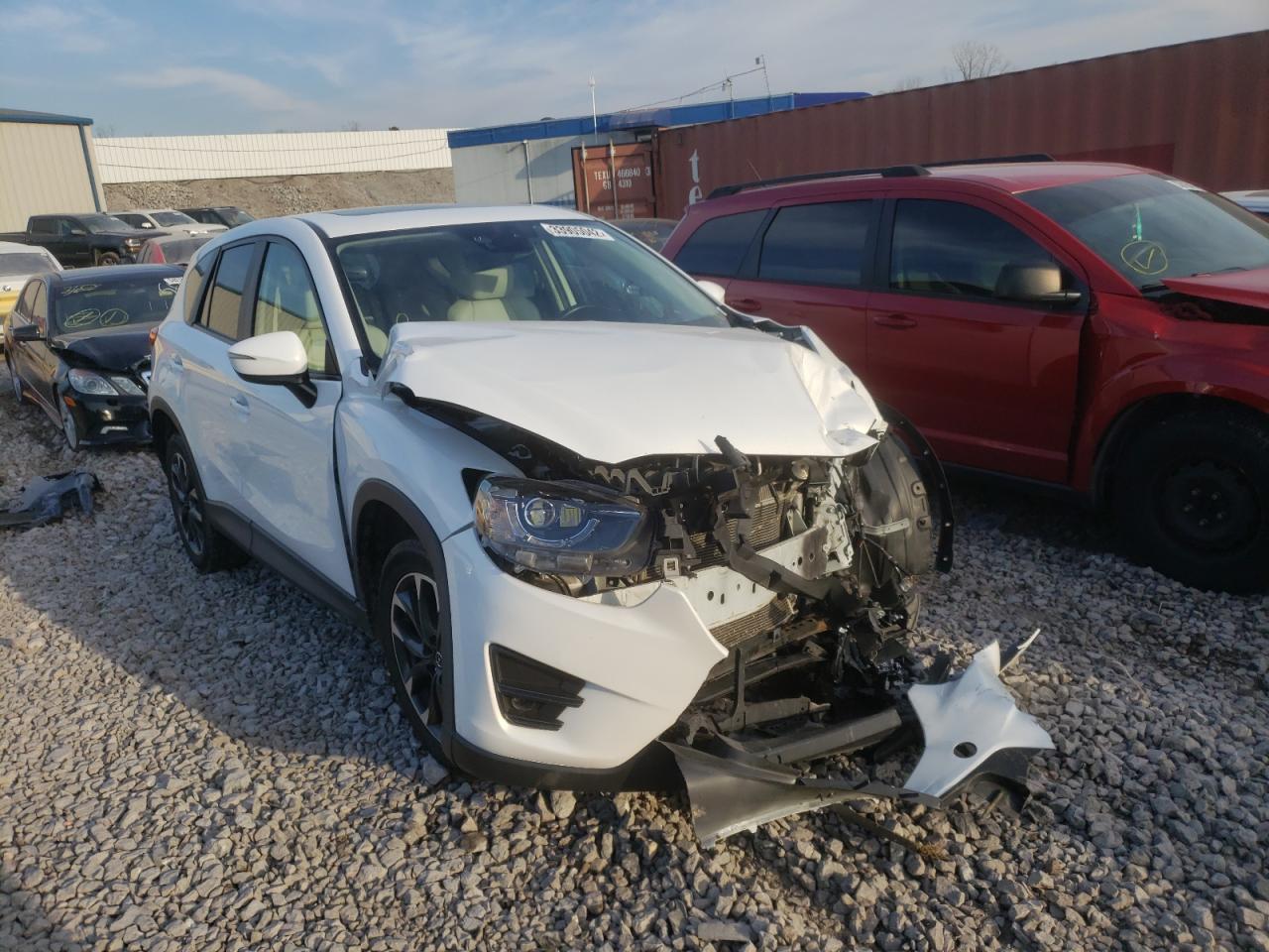 MAZDA CX-5 GT 2016 with VIN JM3KE4DY9G0887651 - Photo from auction