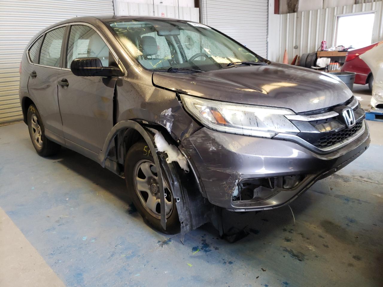Photo 1 from auction – 2015 HONDA CR-V LX with VIN 2HKRM3H39FH502352
