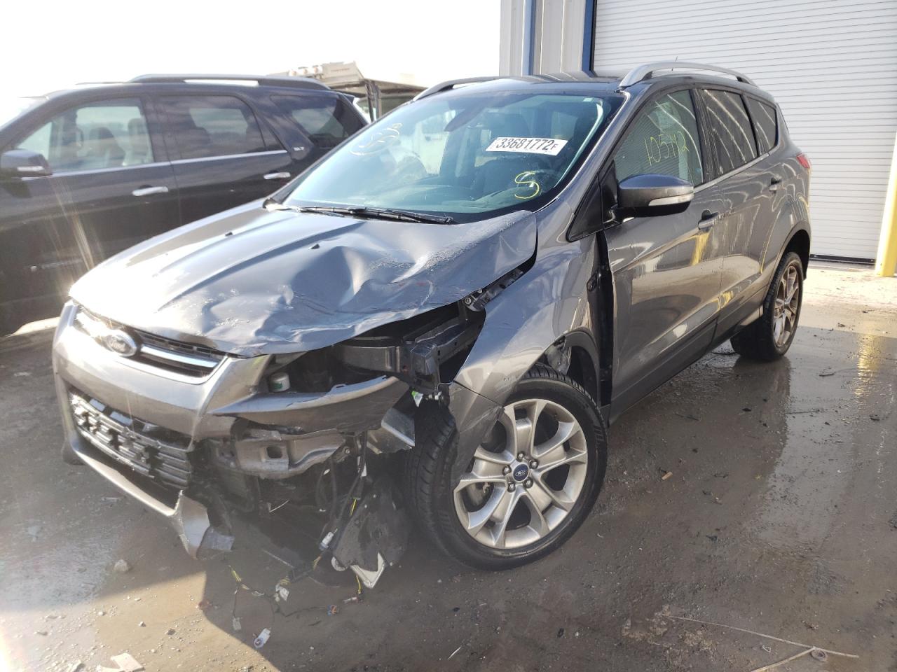 Photo 2 from auction – 2014 FORD ESCAPE TIT with VIN 1FMCU0J98EUD78755