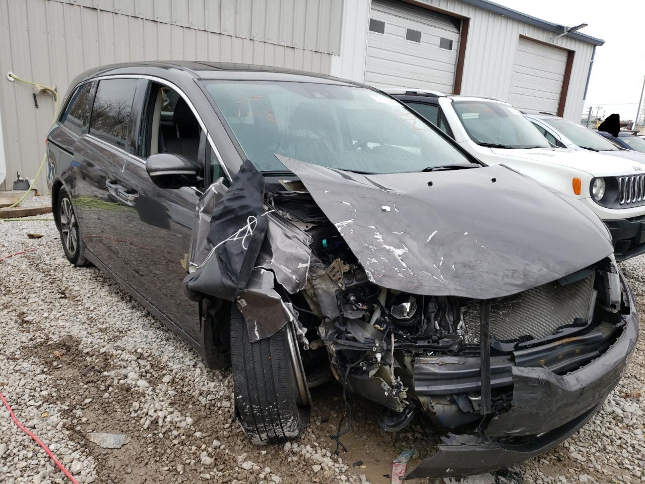 HONDA ODYSSEY TO 2014 with VIN 5FNRL5H90EB048671 - Photo from auction