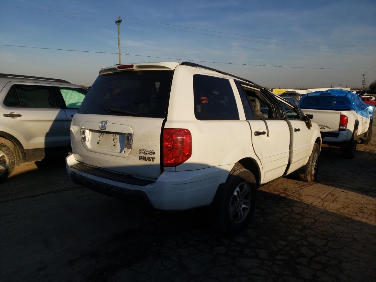 Photo 4 from auction – 2004 HONDA PILOT EXL with VIN 2HKYF18624H512125