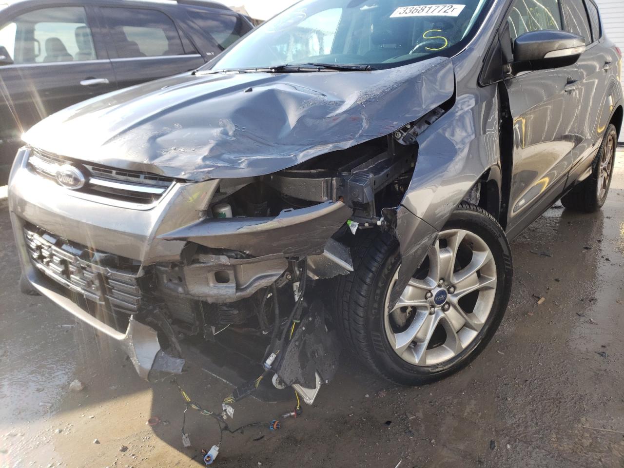 Photo 9 from auction – 2014 FORD ESCAPE TIT with VIN 1FMCU0J98EUD78755