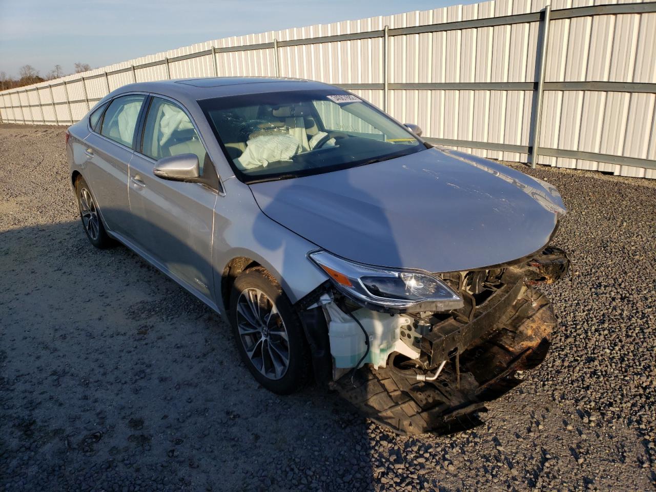 TOYOTA AVALON HYB 2016 with VIN 4T1BD1EB0GU053759 - Photo from auction