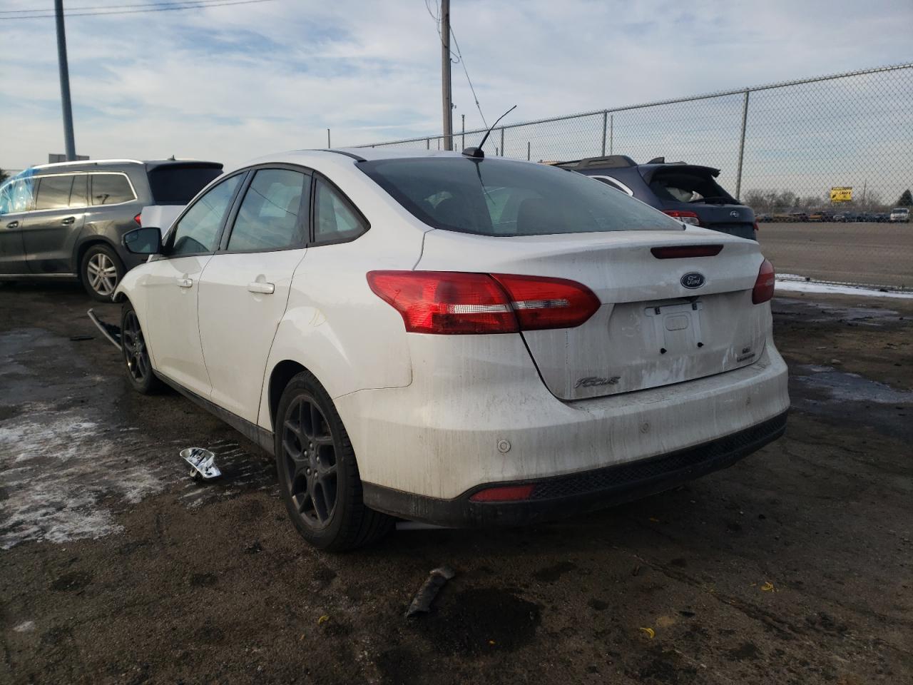 Photo 3 from auction – 2016 FORD FOCUS SE with VIN 1FADP3F24GL359177