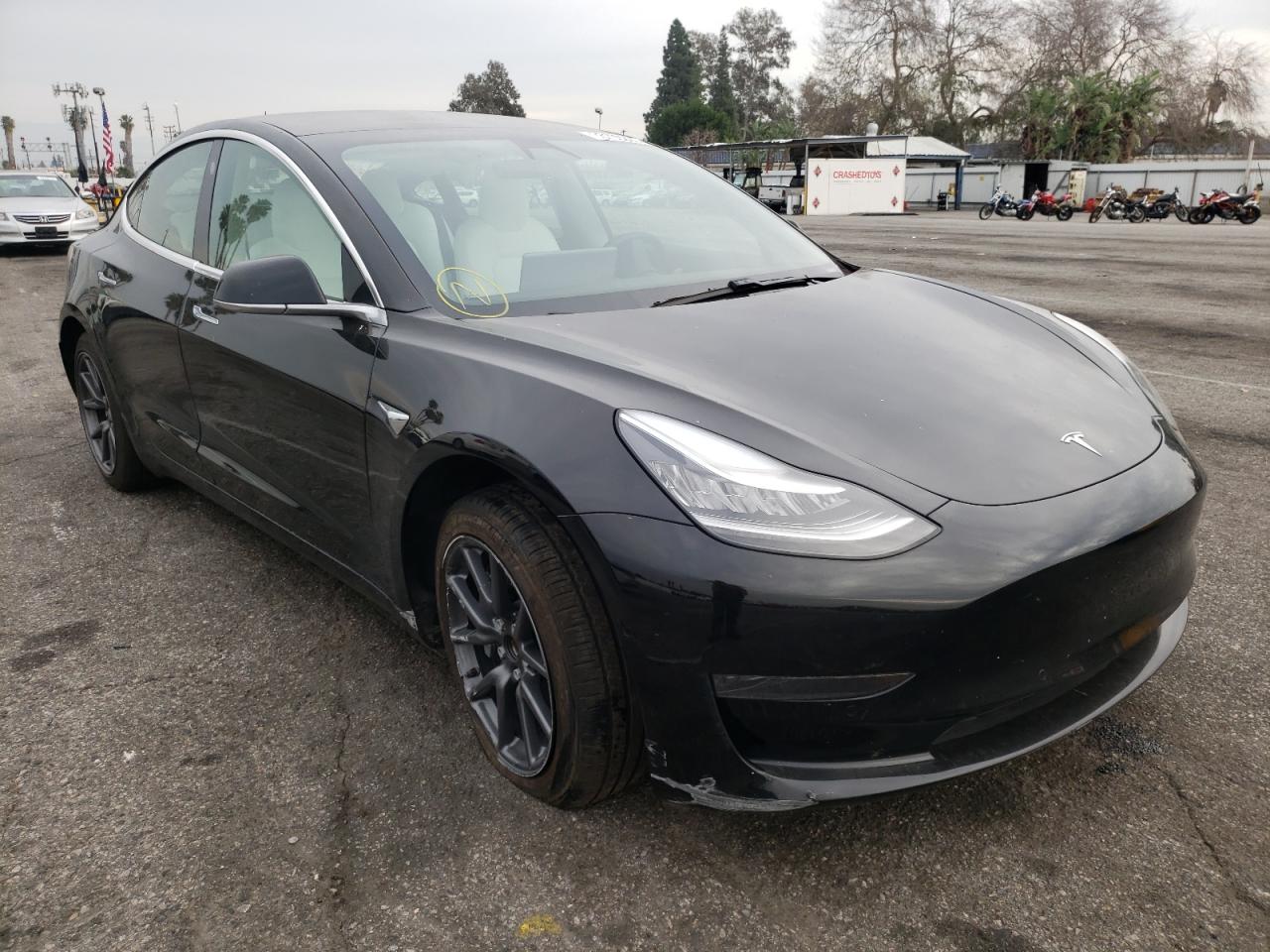 TESLA MODEL 3 2019 with VIN 5YJ3E1EA9KF486270 - Photo from auction
