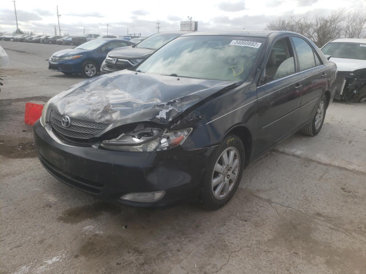 Photo 2 from auction – 2004 TOYOTA CAMRY LE with VIN JTDBF30K540152596