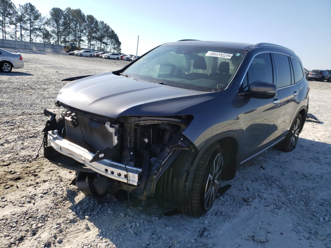 Photo 2 from auction – 2020 HONDA PILOT TOUR with VIN 5FNYF5H64LB004310