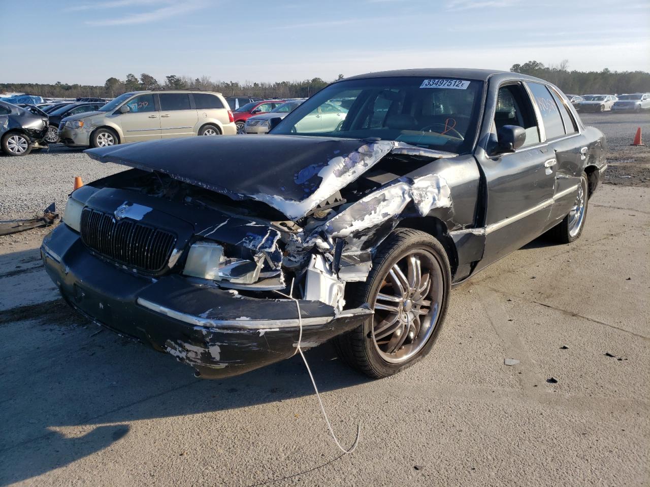 Photo 2 from auction – 2000 MERCURY GRAND MARQ with VIN 2MEFM75W5YX739073