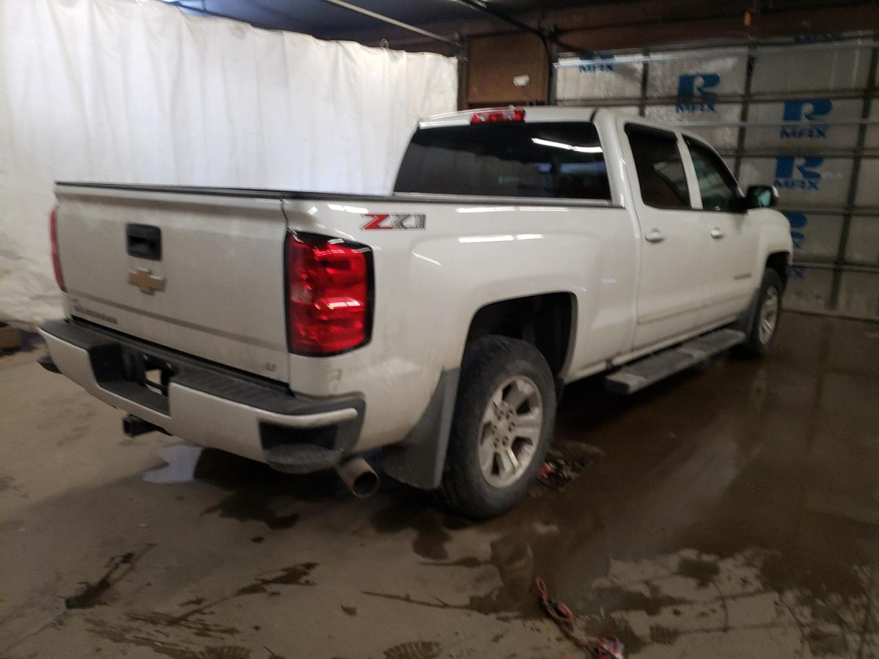 Photo 4 from auction – 2018 CHEVROLET SILVERADO with VIN 3GCUKREC8JG135159