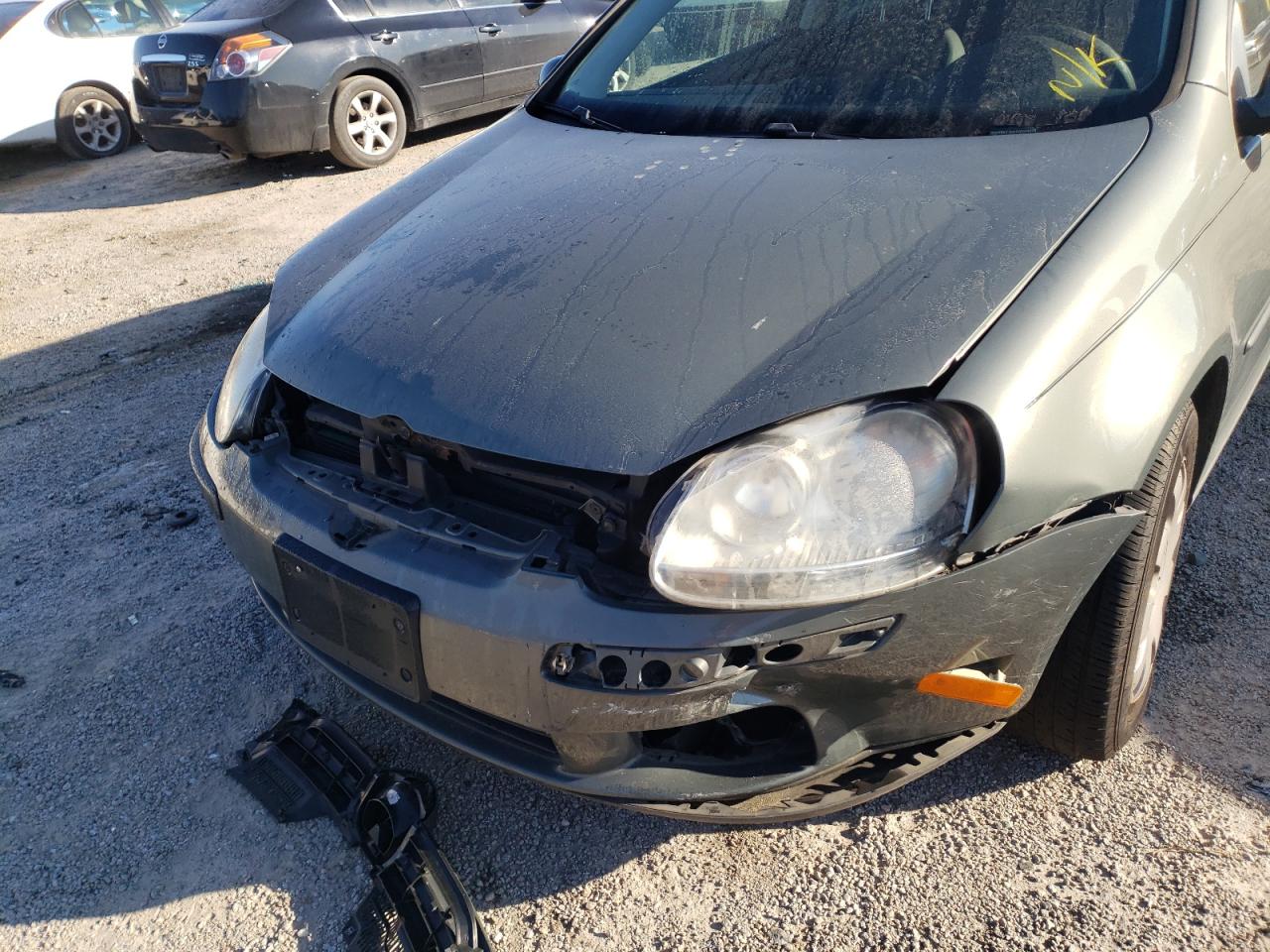 Photo 9 from auction – 2007 VOLKSWAGEN RABBIT with VIN WVWBR71KX7W203850
