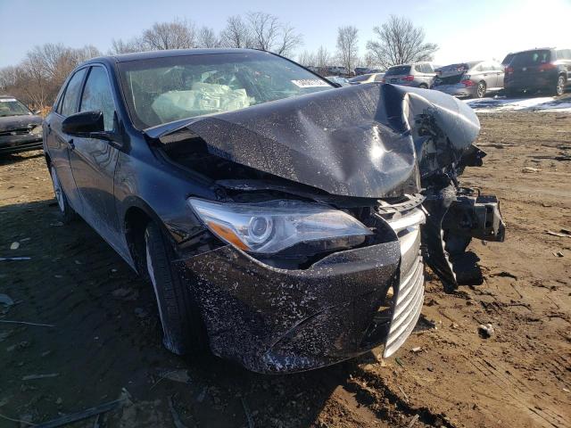 TOYOTA CAMRY LE 2017 with VIN 4T1BF1FK8HU737582 - Photo from auction