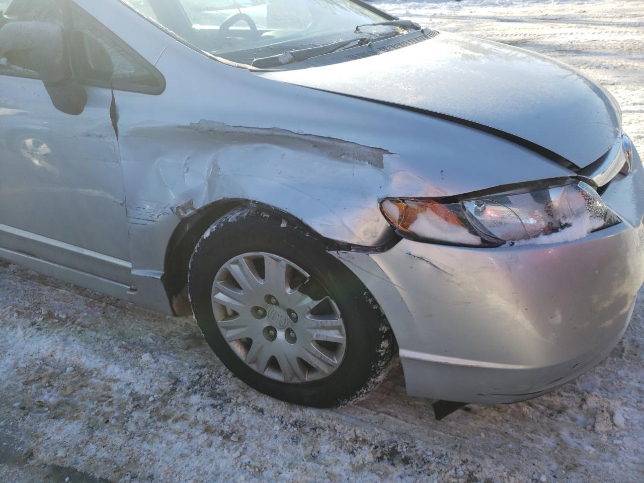 Photo 9 from auction – 2008 HONDA CIVIC DX with VIN 1HGFA15228L012475